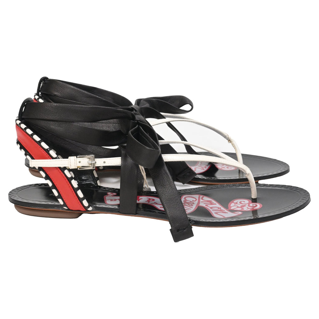 Men's Alaïa Graphic Print Gladiator Sandals in Black Leather