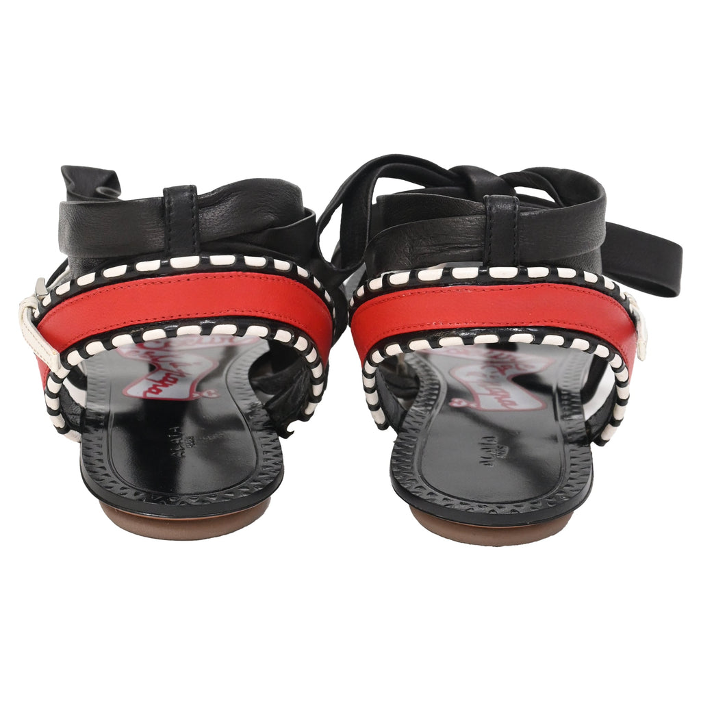 Men's Alaïa Graphic Print Gladiator Sandals in Black Leather