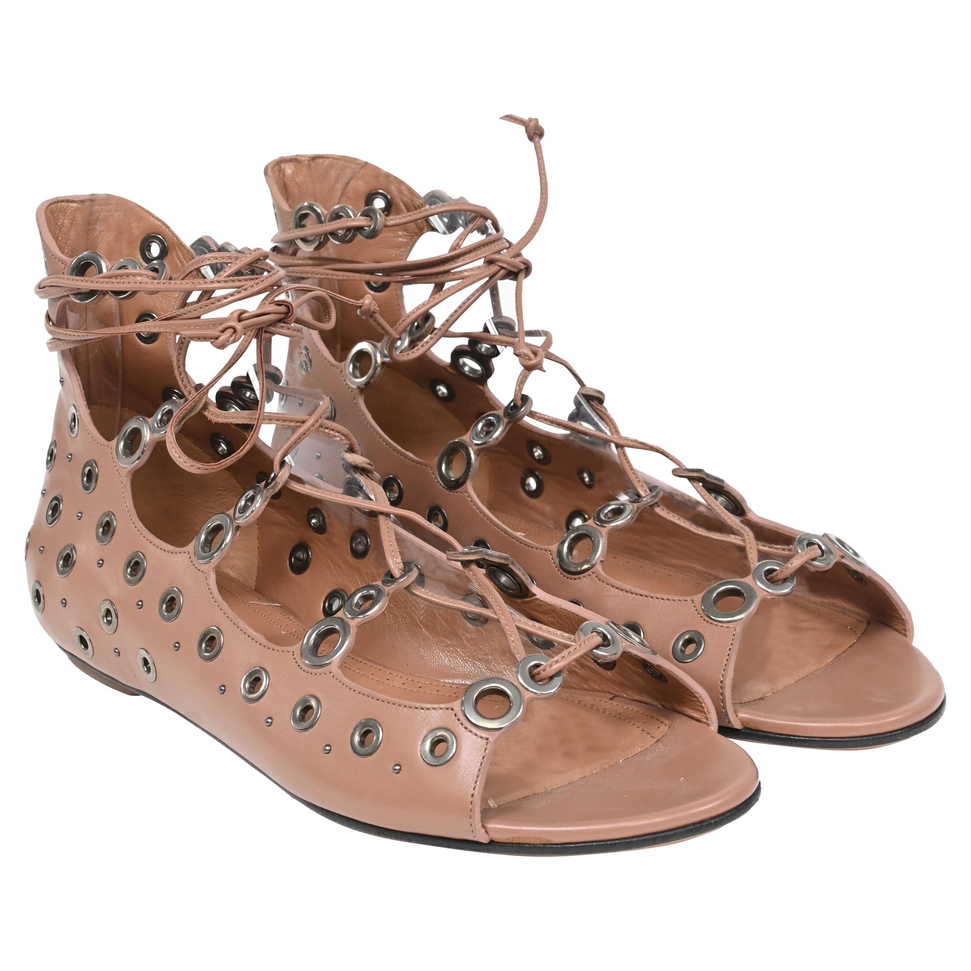 Alaïa Eyelet Strappy Flat Sandals in Brown Leather