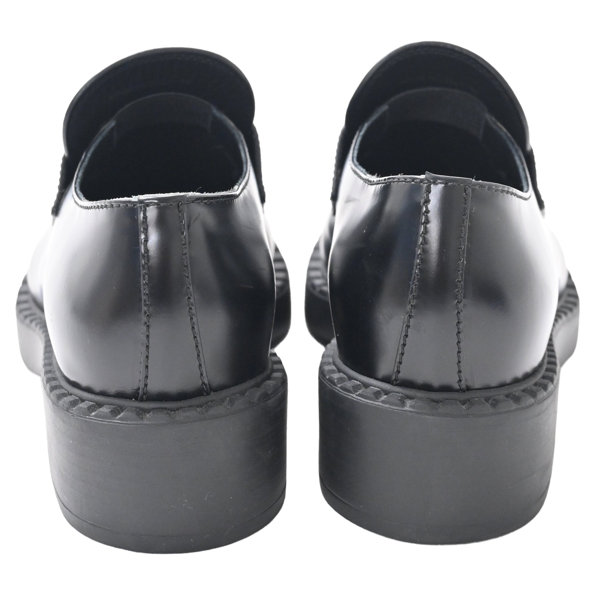 Prada Brushed Platform Loafers in Black Leather