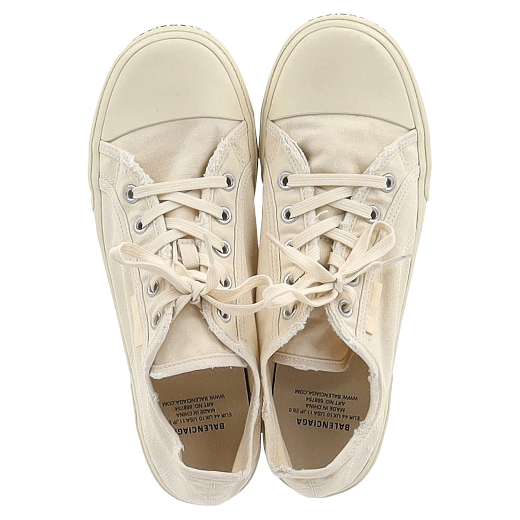 Balenciaga Paris Distressed Low-Top Sneakers in Cream Canvas
