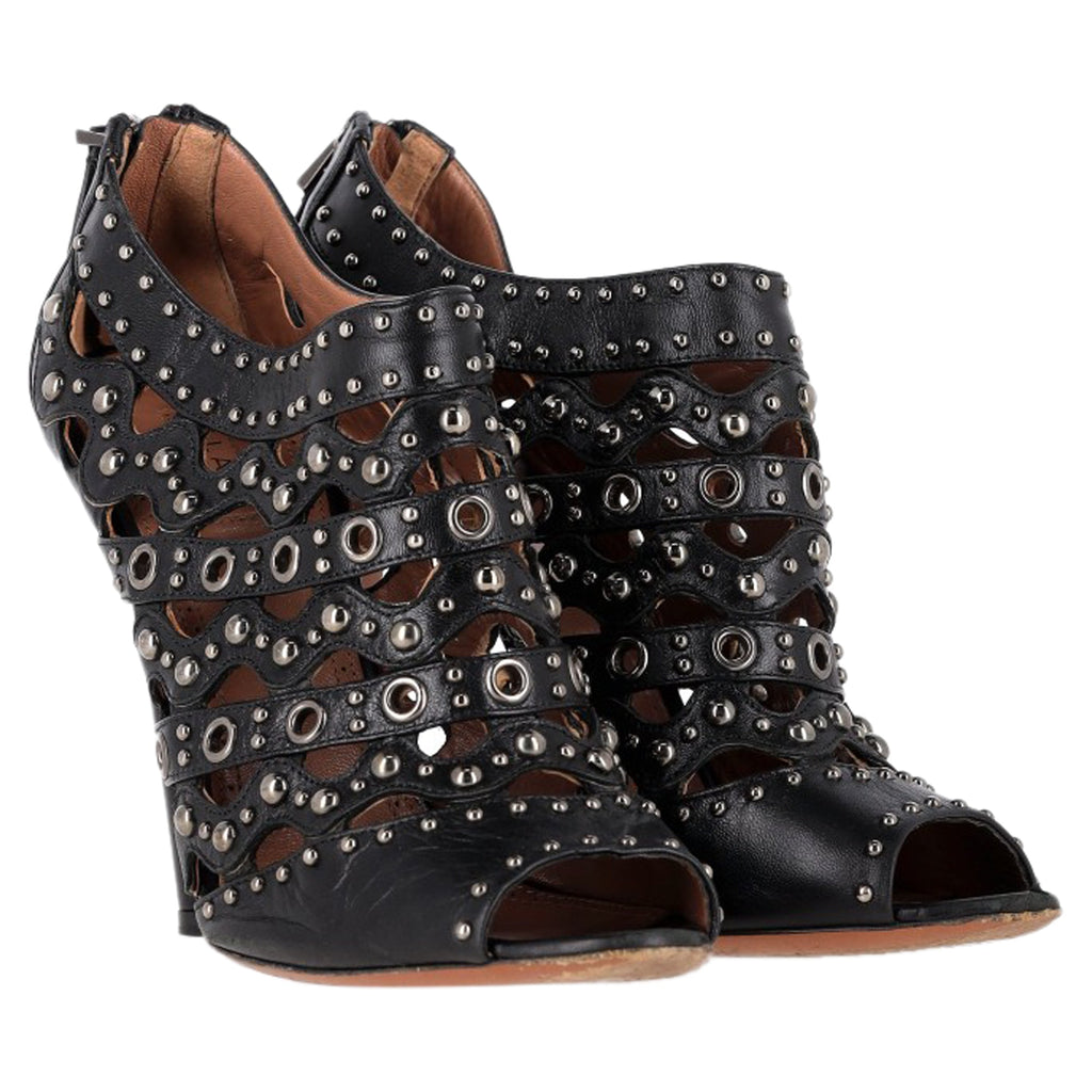 Alaia Studded Lasercut Sandal Heels in Black Leather