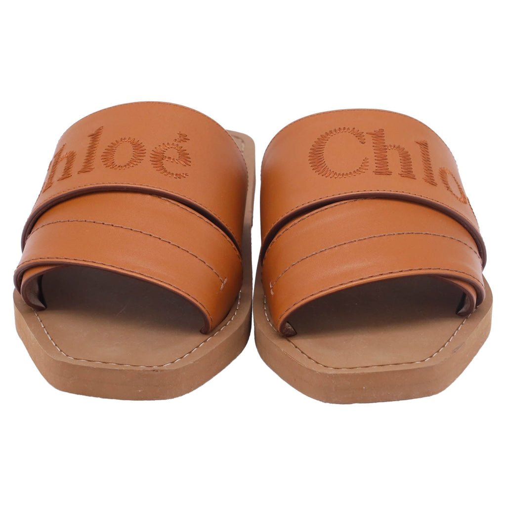 Chloé Woody Embroidered Logo Flat Sandals in Brown Leather