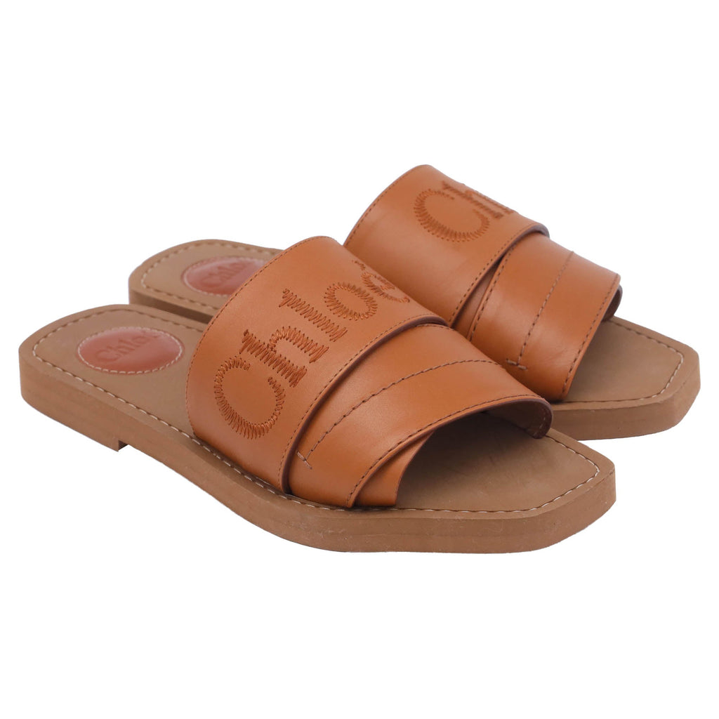 Chloé Woody Embroidered Logo Flat Sandals in Brown Leather