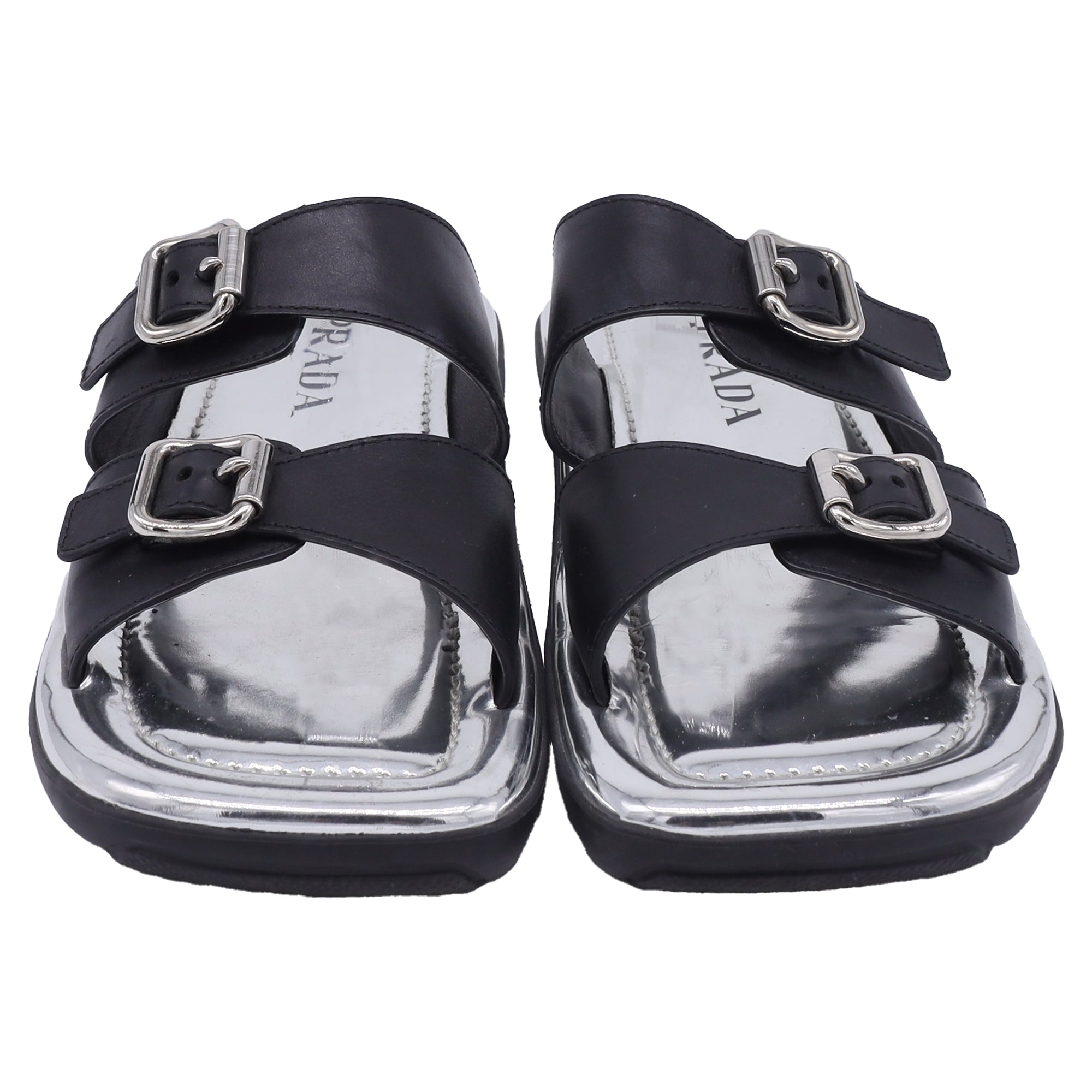 Prada Buckled Flat Sandals in Silver Leather