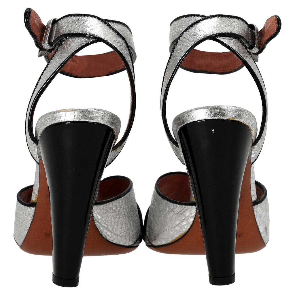 Alaia Cross Strap High Heel Sandals in Silver Leather