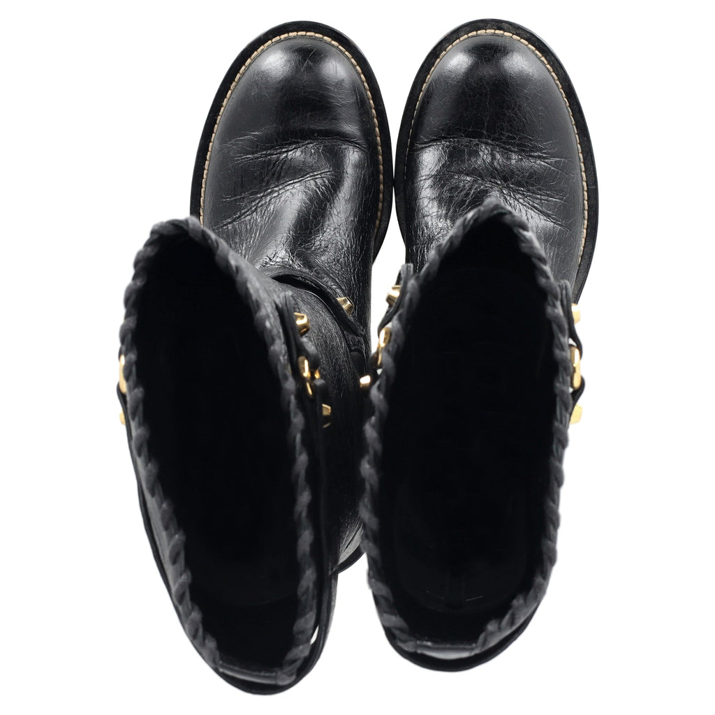 Women's  Balenciaga Distressed Knee-High Riding Boots in Black Leather