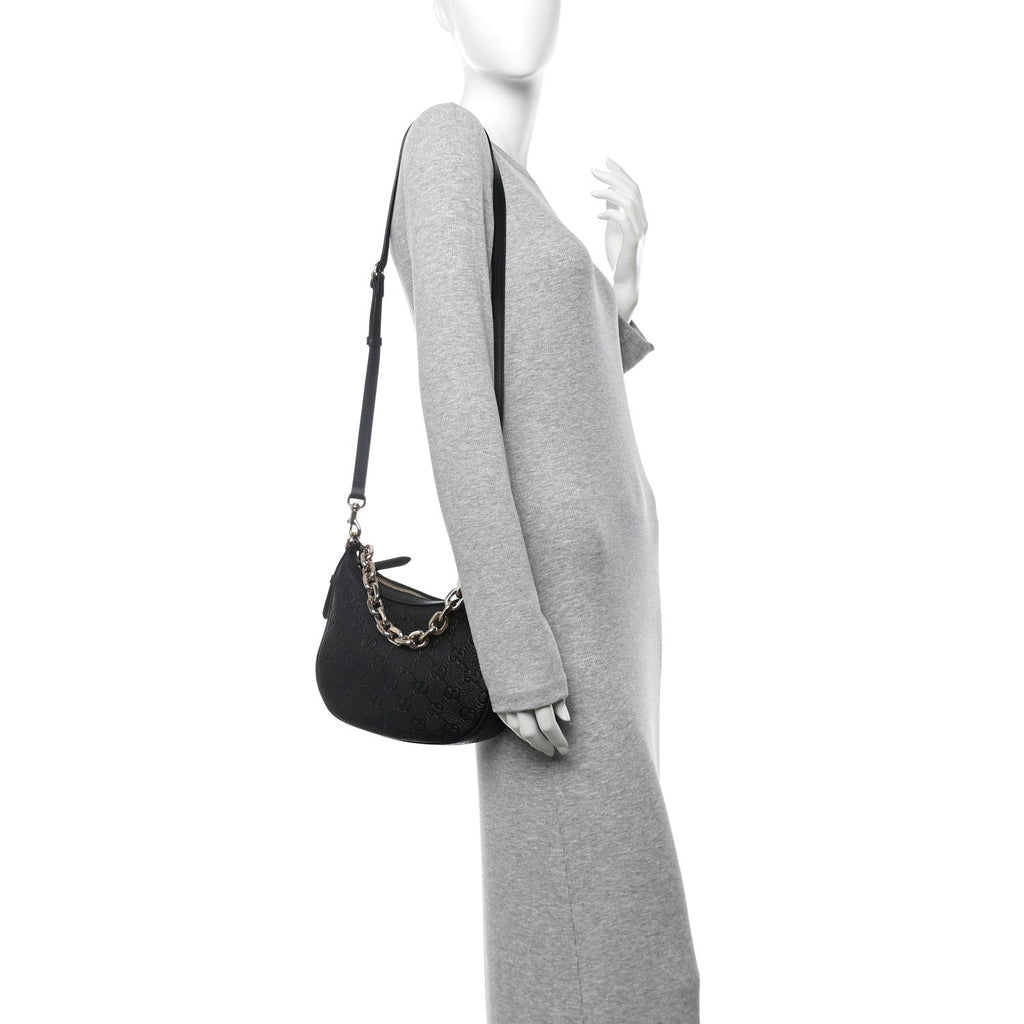 Grainy Calfskin GG Embossed Emblem Small Half Moon Shoulder Bag Black
