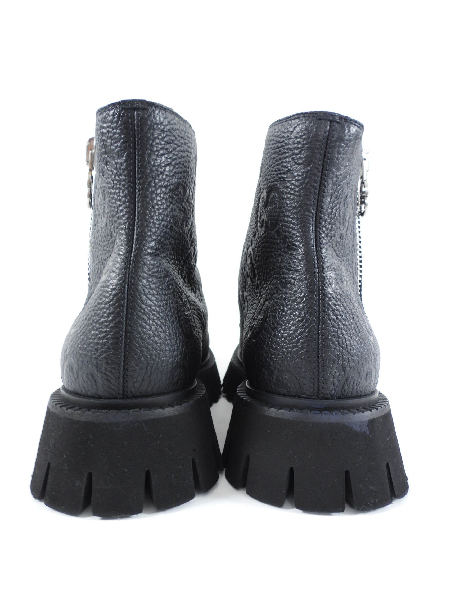 Gucci Black Leather GG Embossed Zip Combat Boots - 39.5