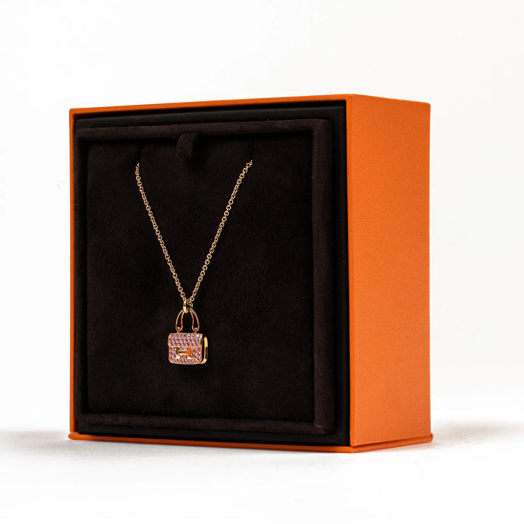 Hermès Amulettes Constance Pendant 18K Rose Gold and Pink Saphhire