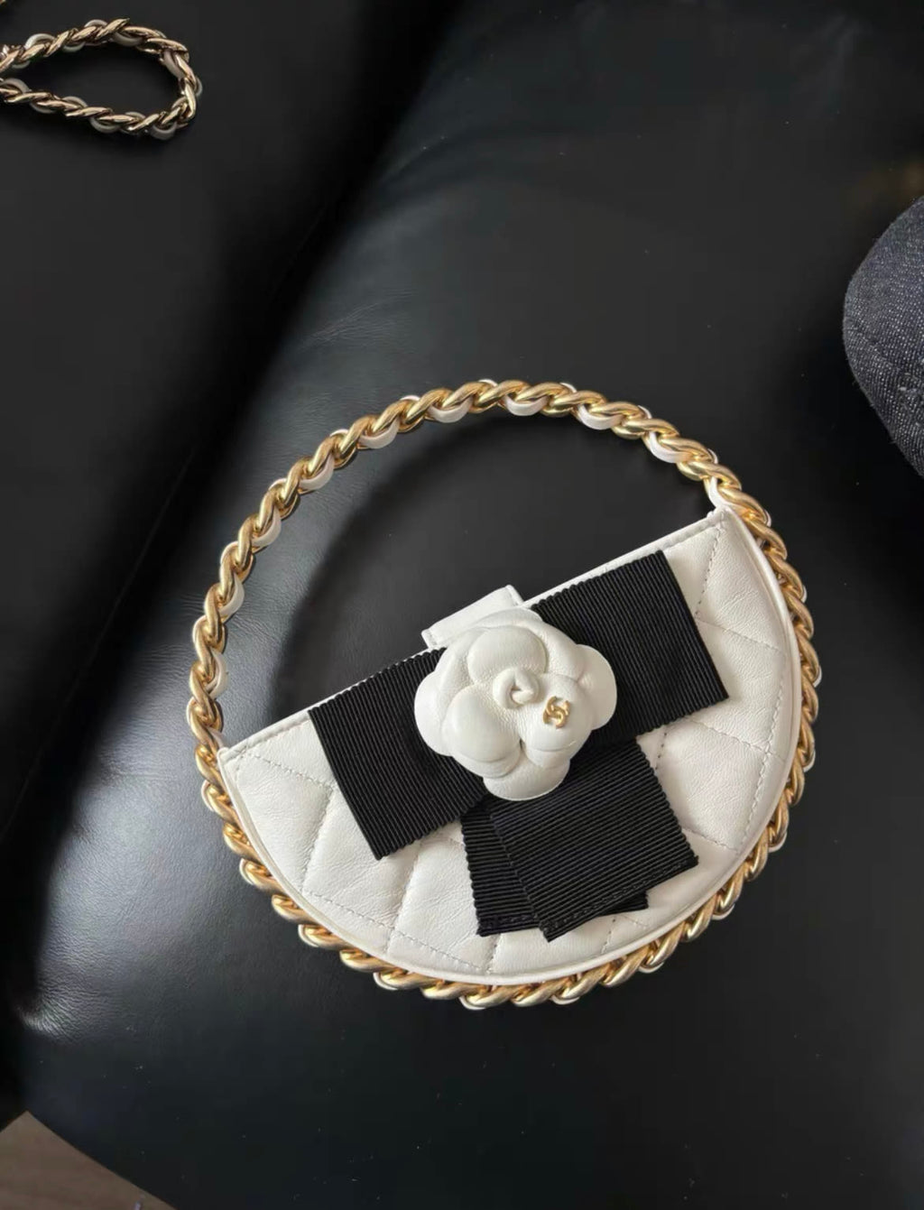 Chanel 23  White Quilted Leather Mini Round Camellia Clutch