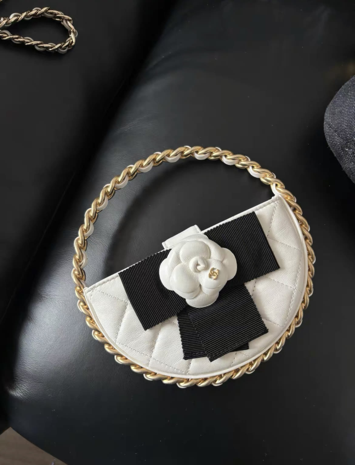 Chanel 23  White Quilted Leather Mini Round Camellia Clutch