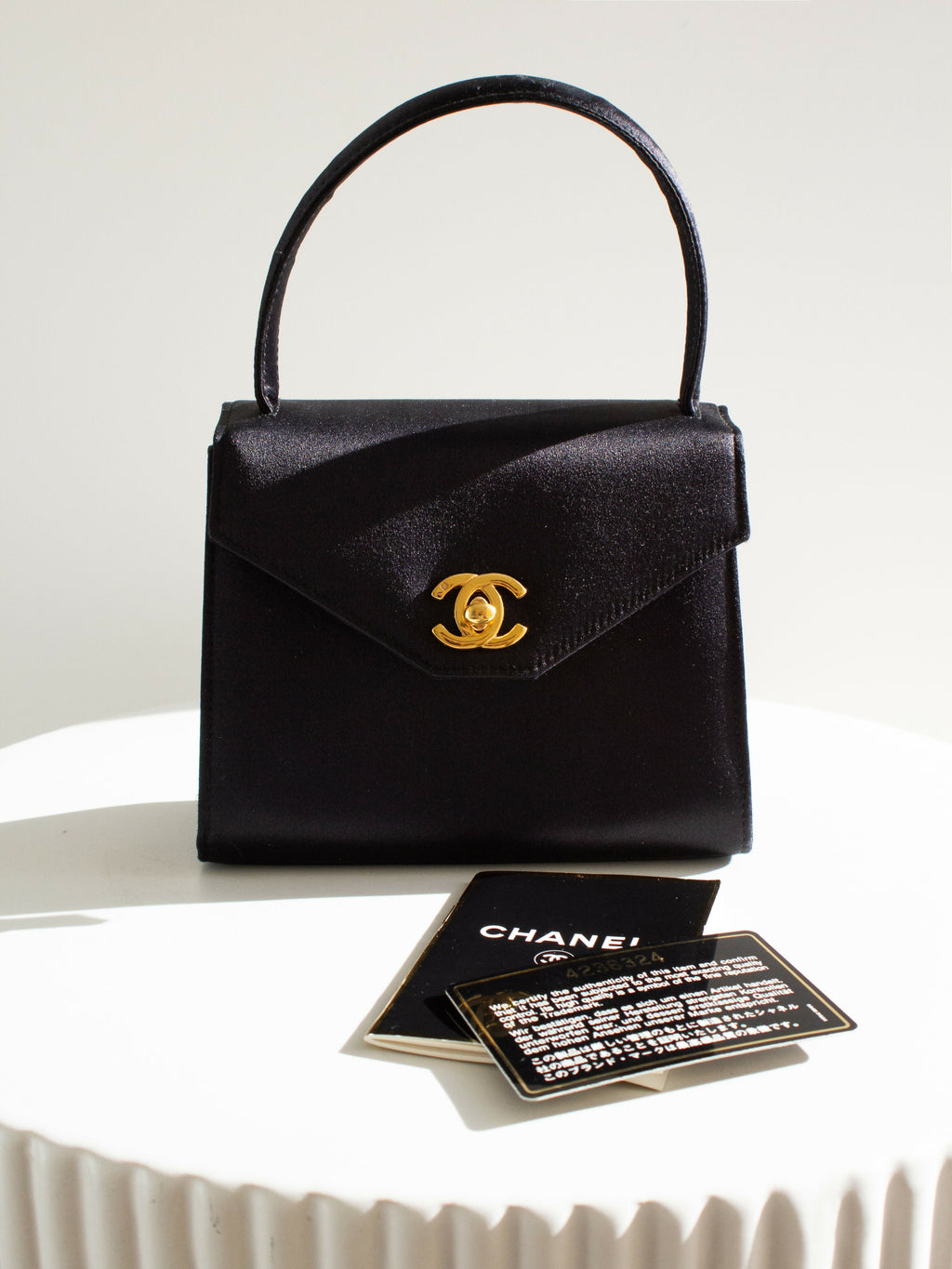 Chanel Vintage Kelly 1996 Black Satin 24K Gold Mini Evening Bag