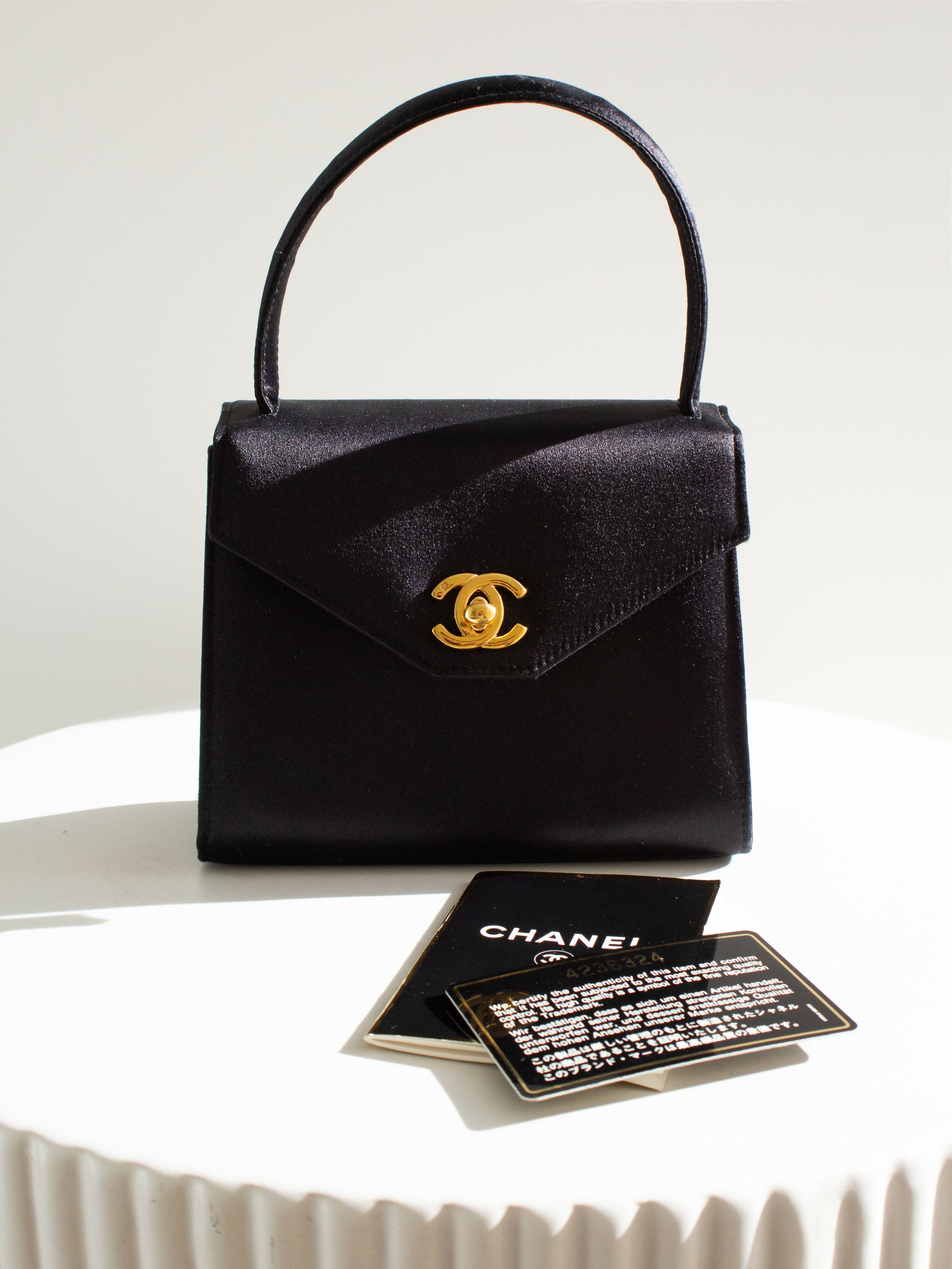 Chanel Vintage Kelly 1996 Black Satin 24K Gold Mini Evening Bag