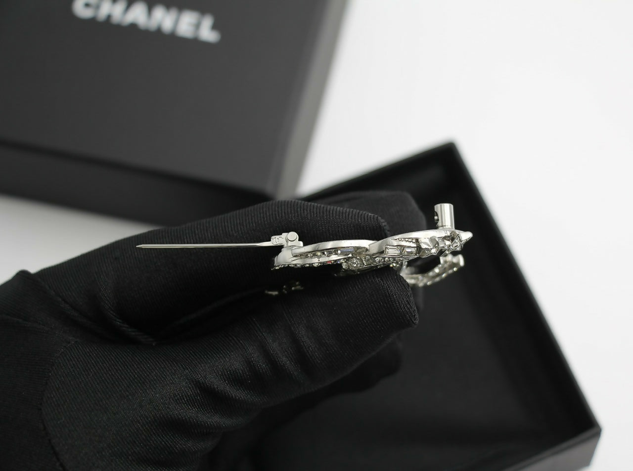Chanel C21S Rhinestone Metal Silver Star Twist Brooch