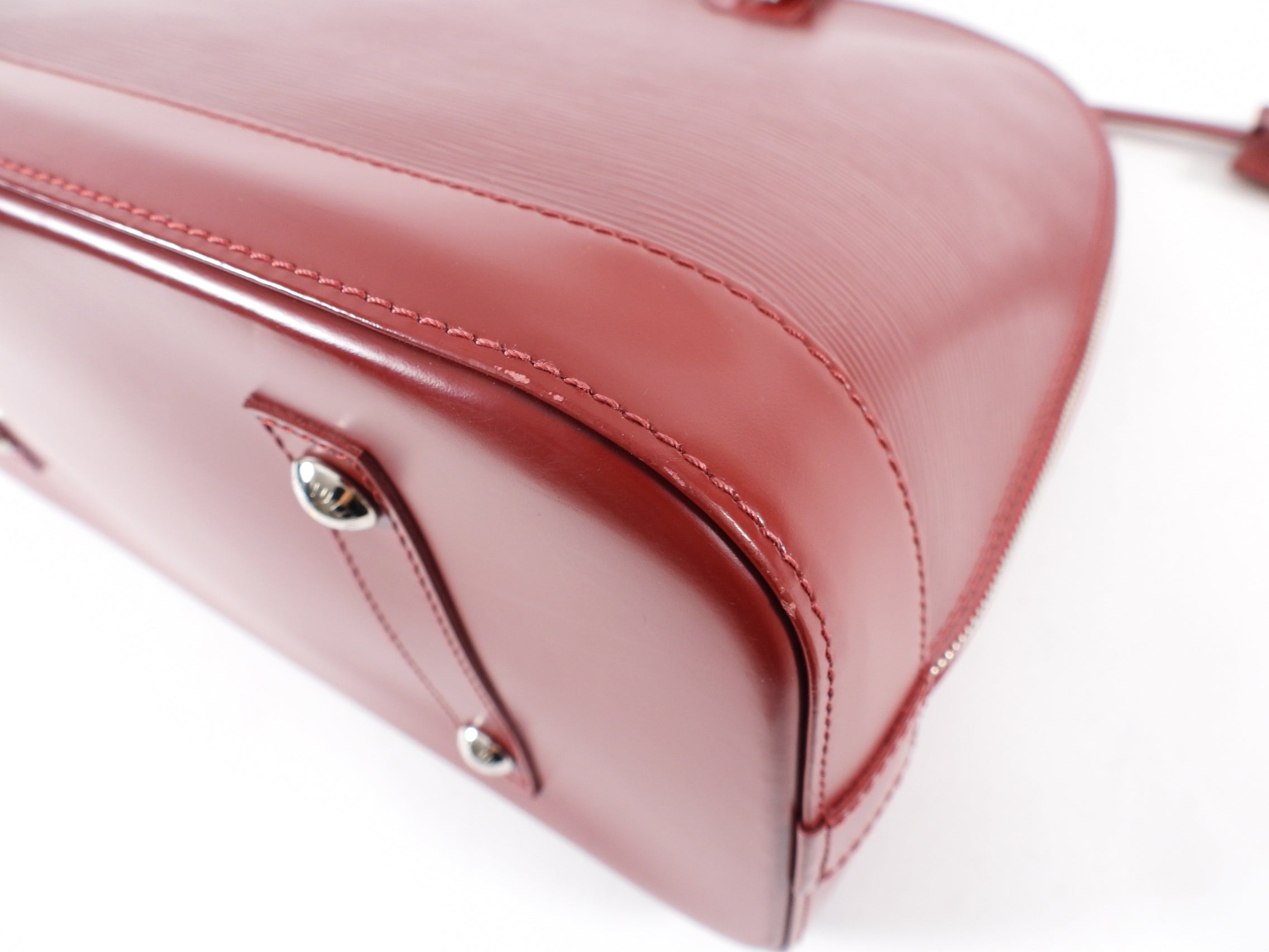 Louis Vuitton Carmine Epi Alma GM Bag