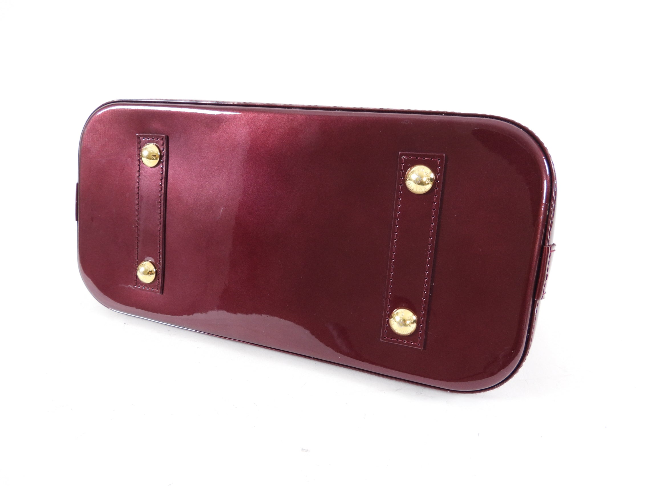 Louis Vuitton Alma PM bag in Monogram Vernis Rouge Fauviste