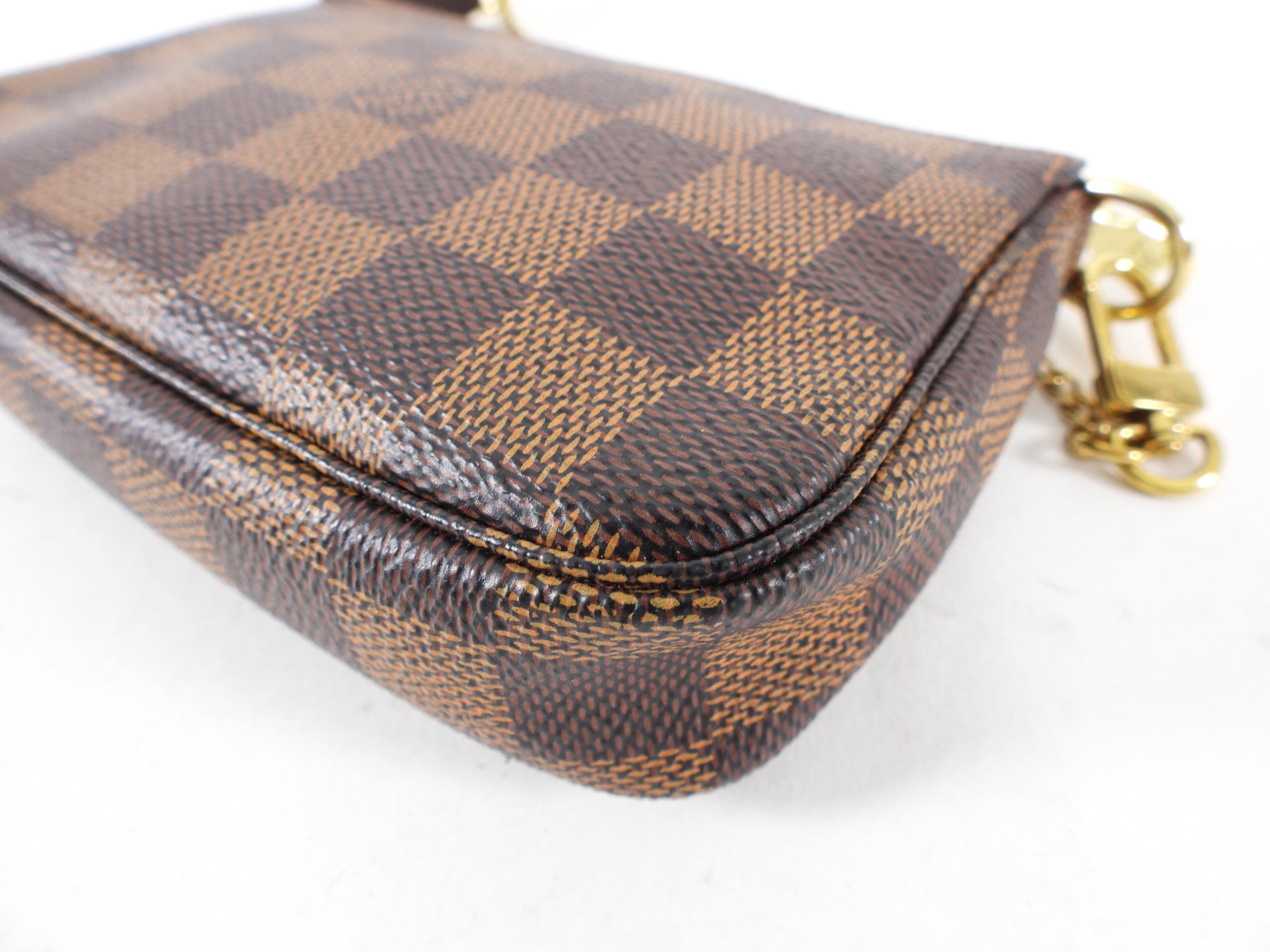 Louis Vuitton Damier Ebene Mini Pochette Accessoires Bag