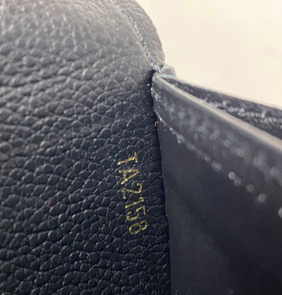 Louis Vuitton Damier Ebene Clapton Long Wallet