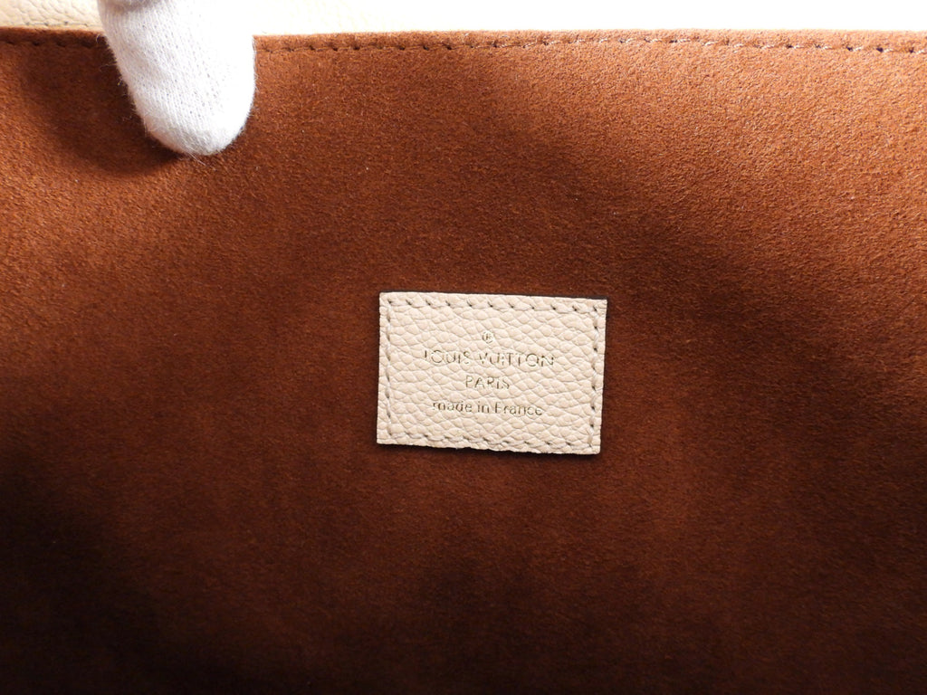 Louis Vuitton Pochette Metis Empreinte Monogram Crossbody Bag