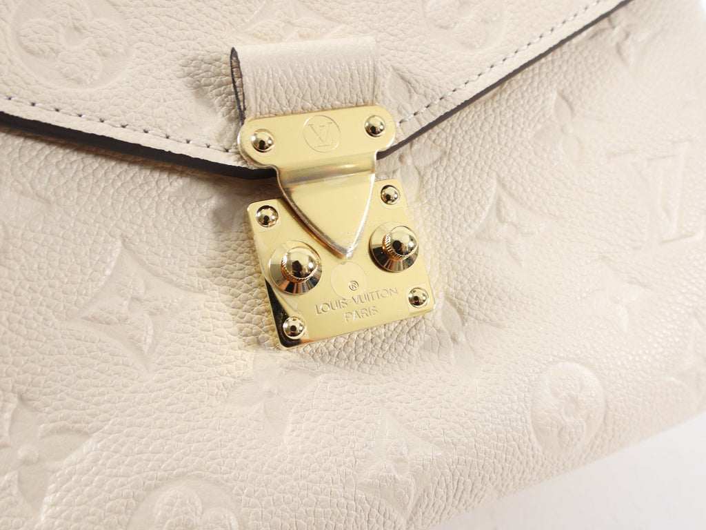 Louis Vuitton Pochette Metis Empreinte Monogram Crossbody Bag