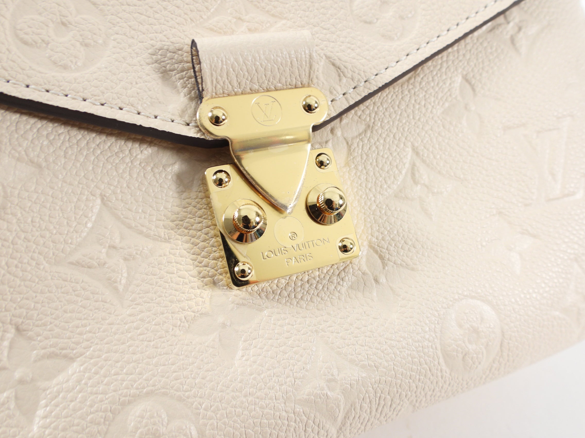 Louis Vuitton Pochette Metis Empreinte Monogram Crossbody Bag