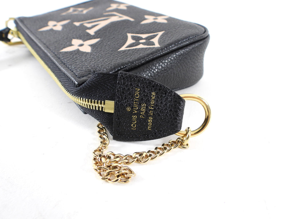 Louis Vuitton Bicolour Mini Pochette Accessoires Empreinte Monogram