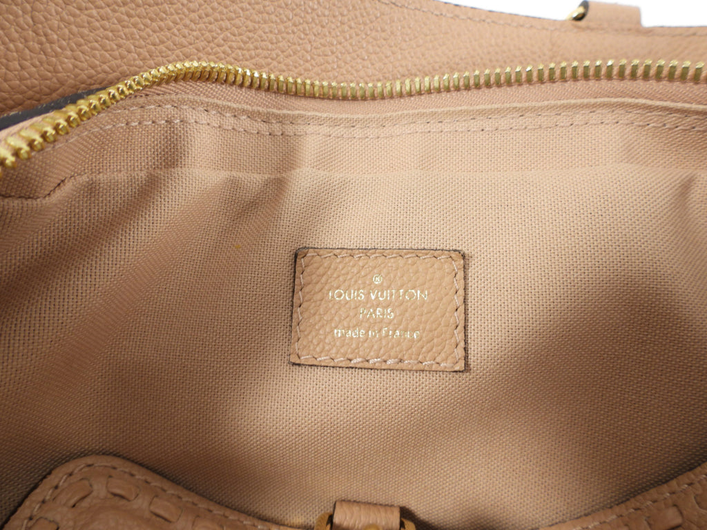 Louis Vuitton Empreinte Leather Vosges MM Papyrus Bag