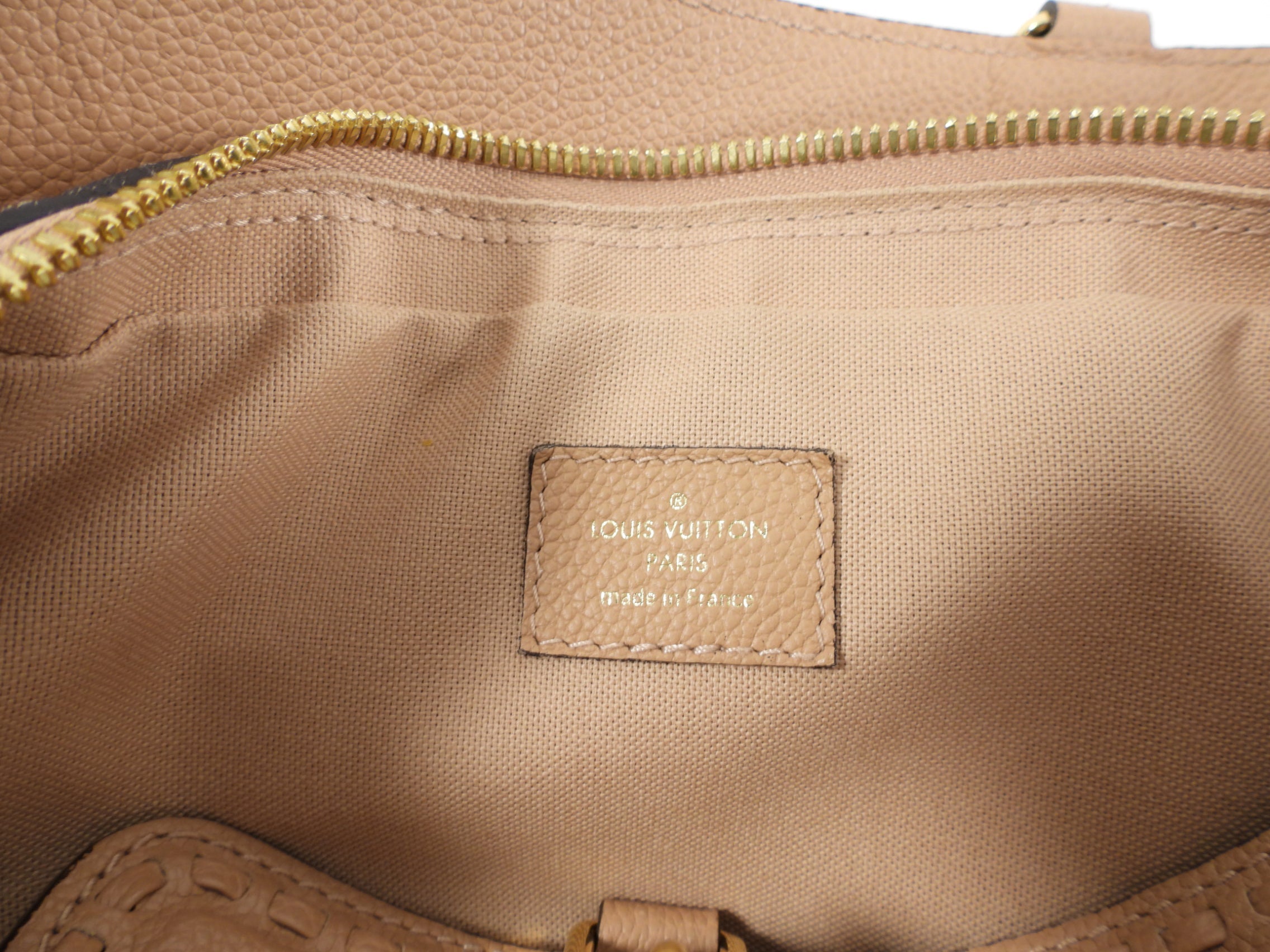 Louis Vuitton Empreinte Leather Vosges MM Papyrus Bag