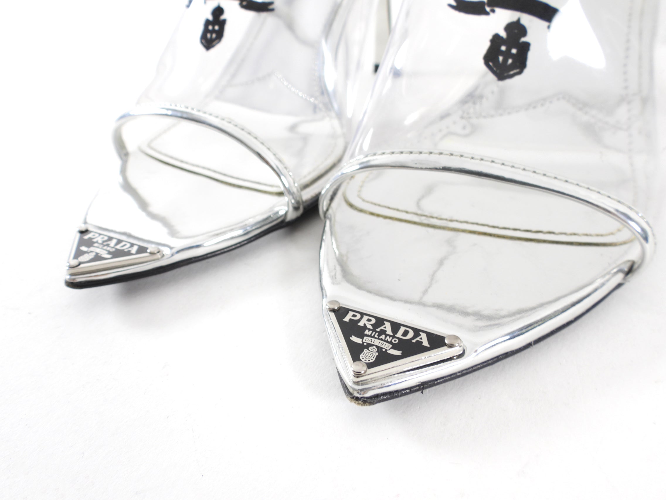 Prada Silver Metallic Patent Leather and PVC Triangle Logo Pointed Mules - 37