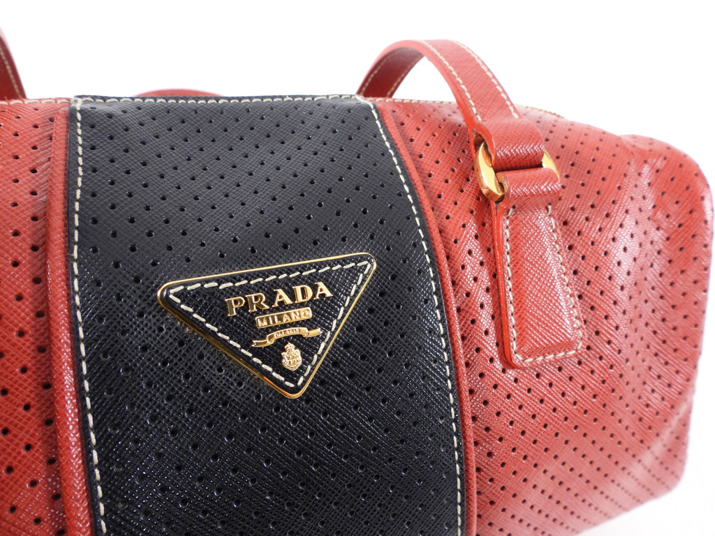 Prada Red and Black Saffiano Fori Small Barrel Bag