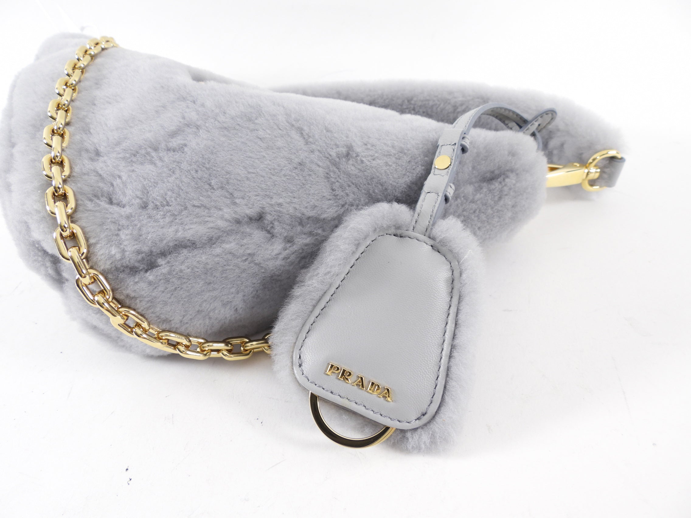 Prada Light Grey Shearling and Gold Chain Mini Re-Edition Triangle Bag