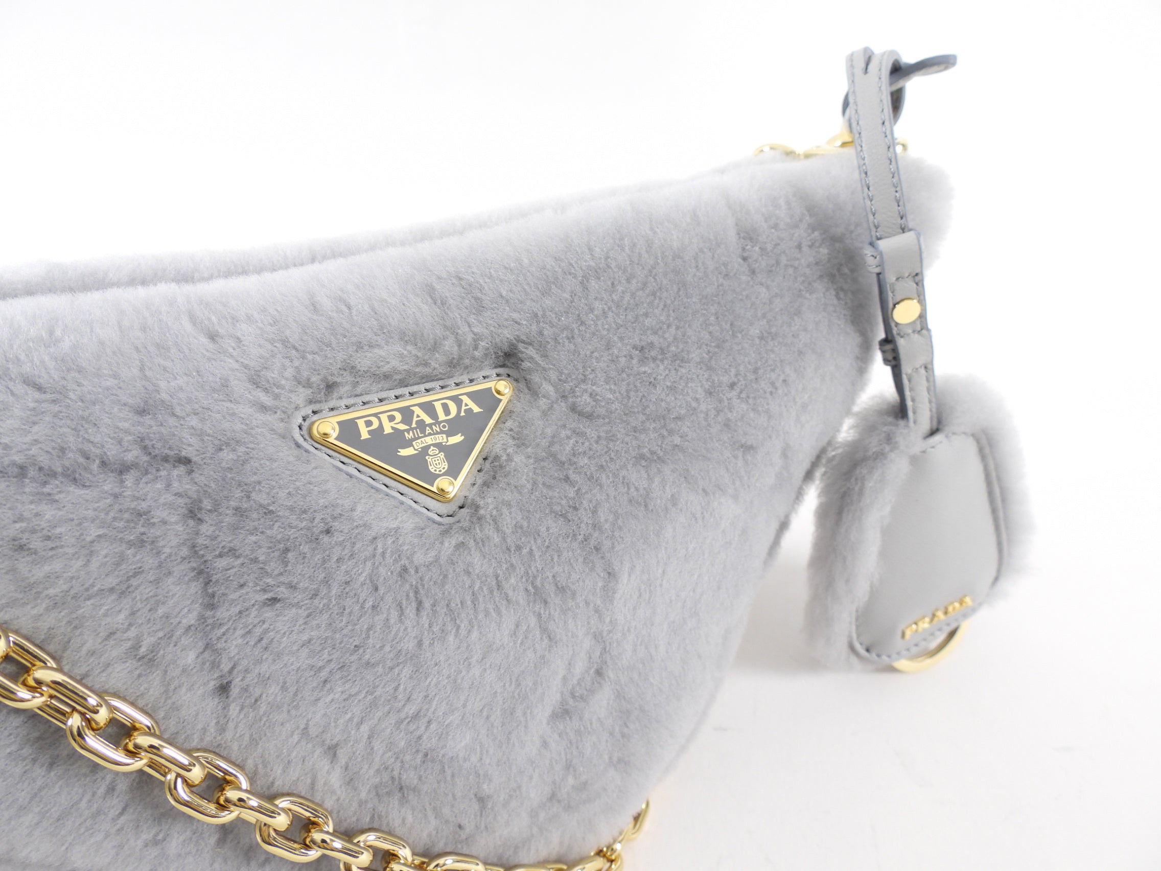Prada Light Grey Shearling and Gold Chain Mini Re-Edition Triangle Bag