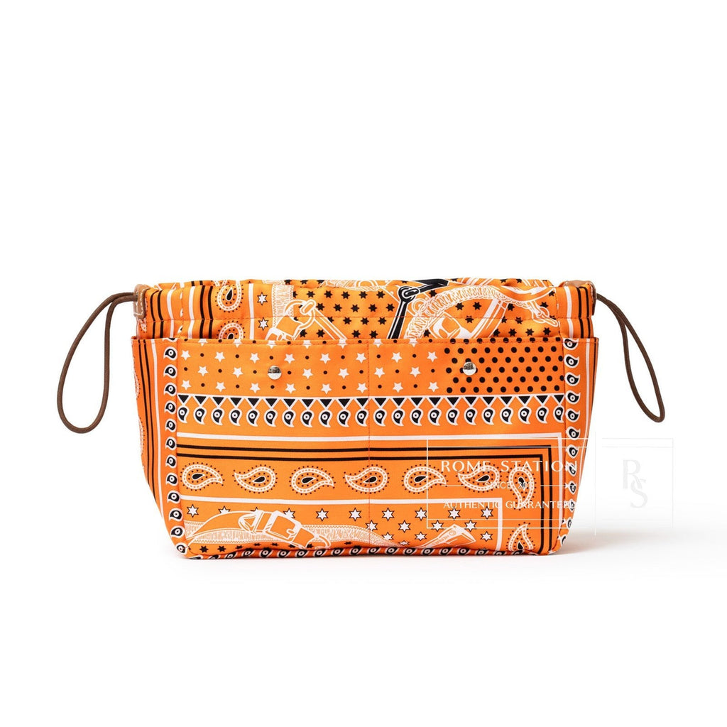 Hermès Fourbi 25 pouch Orange Nylon/Silk Barenia Palladium Hardware