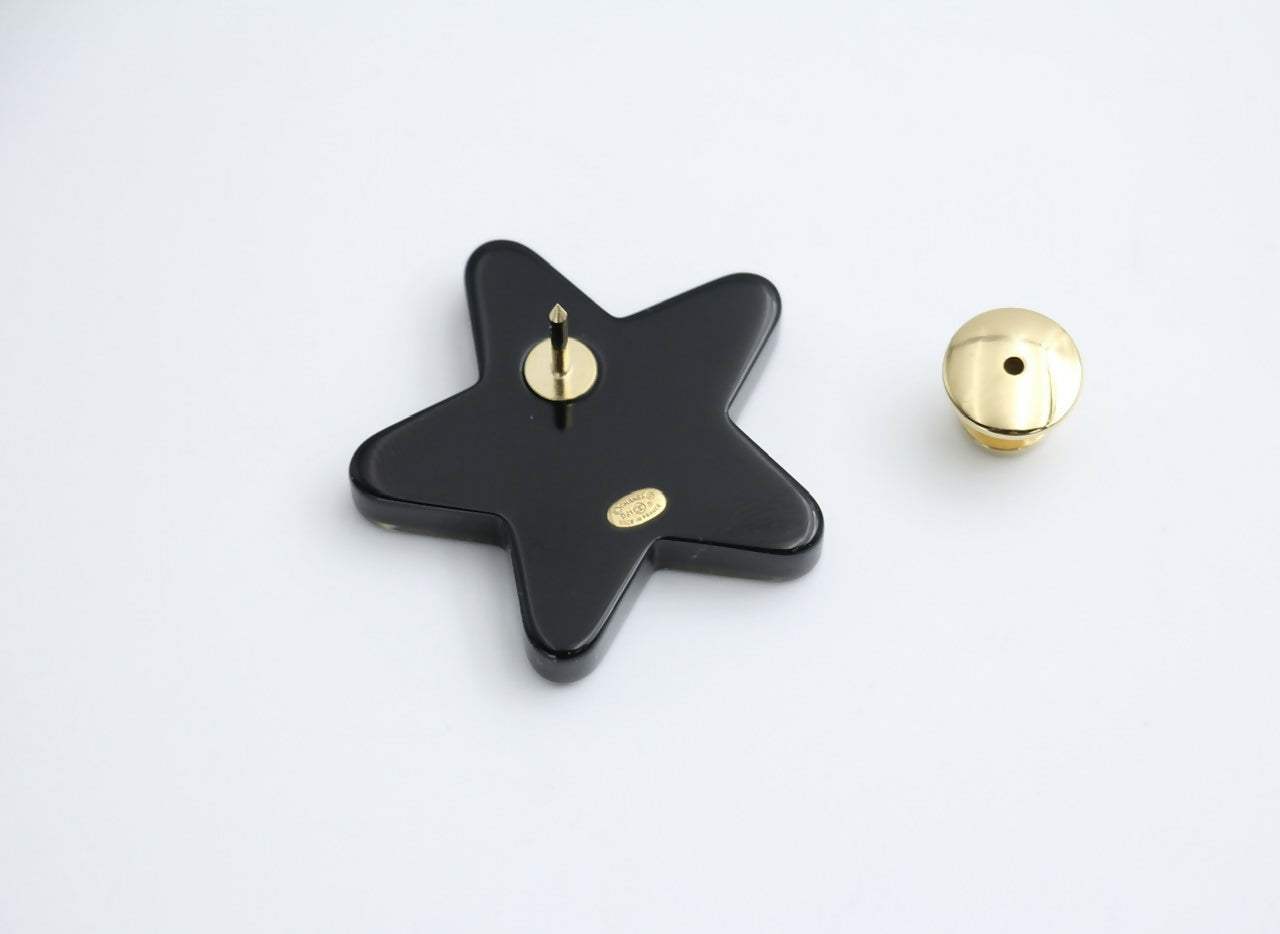 Chanel D21S Resin Black Gold Star Brooch