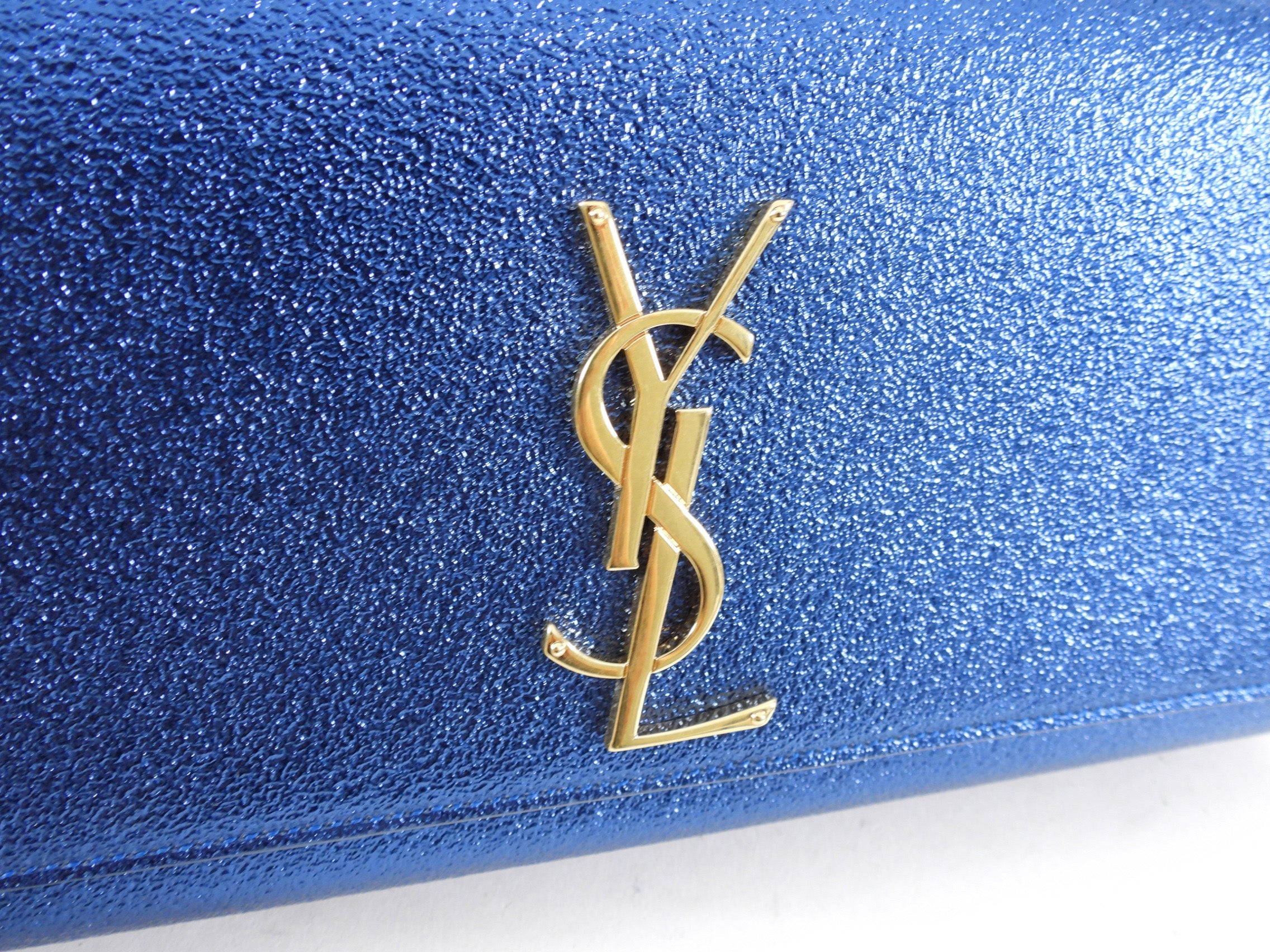 Saint Laurent Metallic Blue Cassandre Clutch Bag
