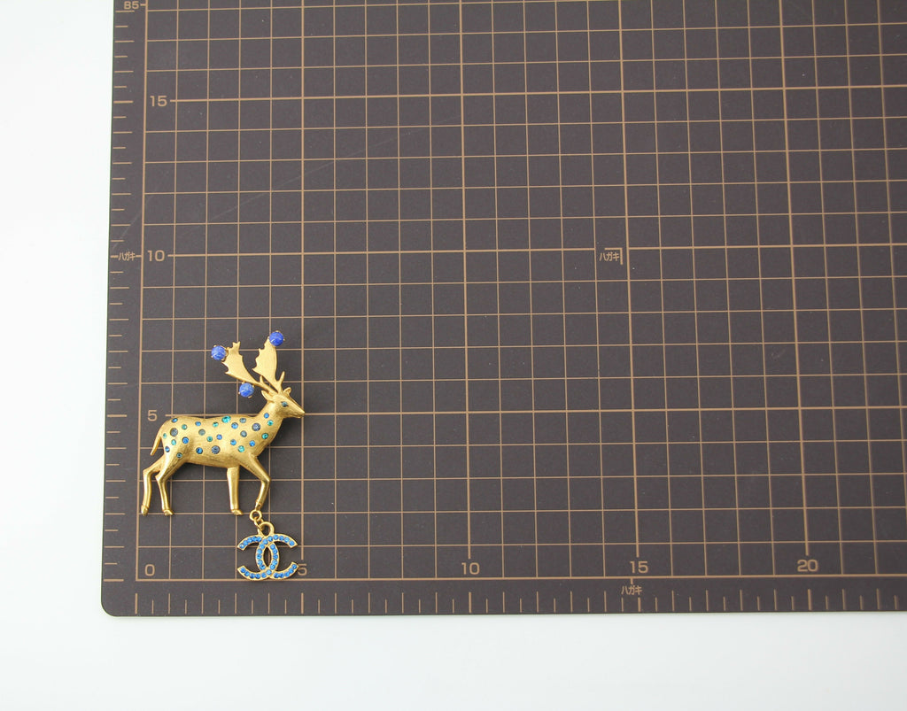 Chanel Vintage 01A Rhinestone Blue Golden Green Reindeer Brooch