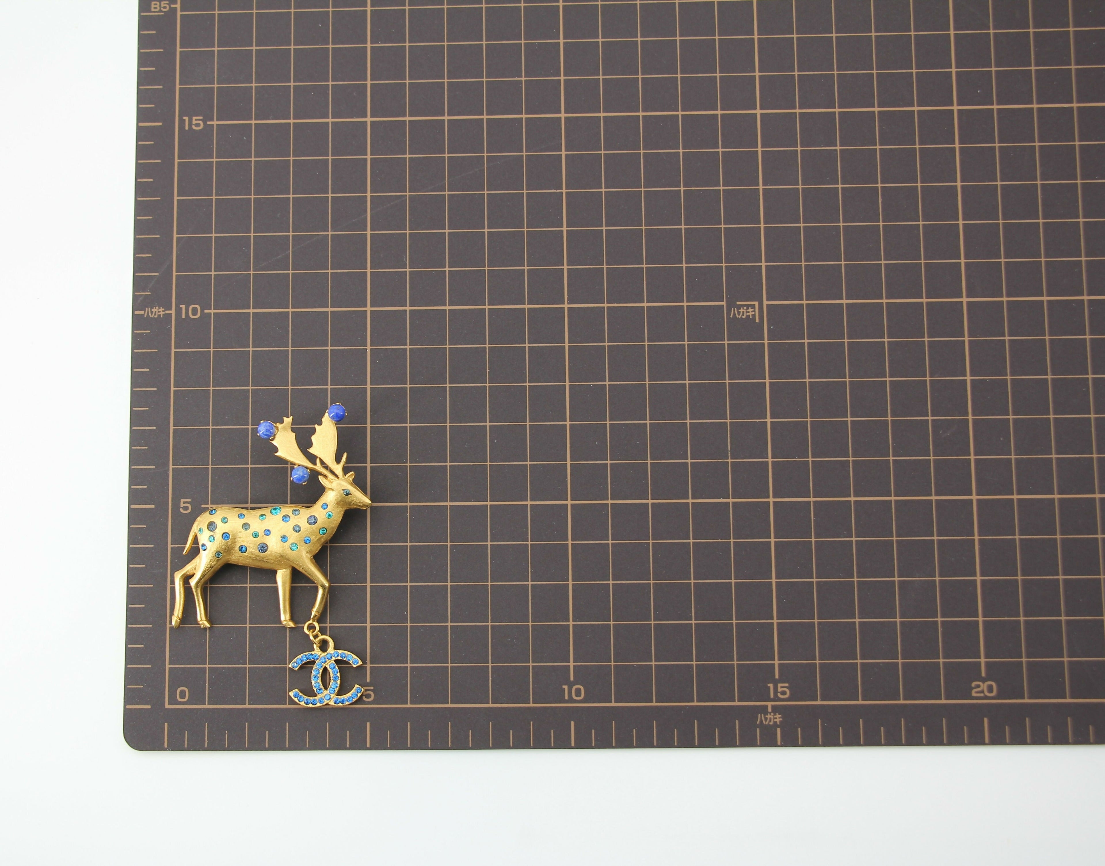 Chanel Vintage 01A Rhinestone Blue Golden Green Reindeer Brooch