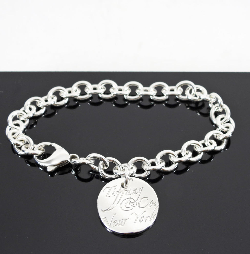 Tiffany & Co.  Sterling Silver Script Notes Tag Bracelet