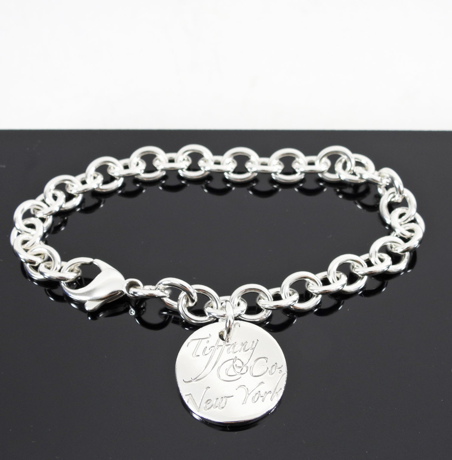 Tiffany & Co.  Sterling Silver Script Notes Tag Bracelet